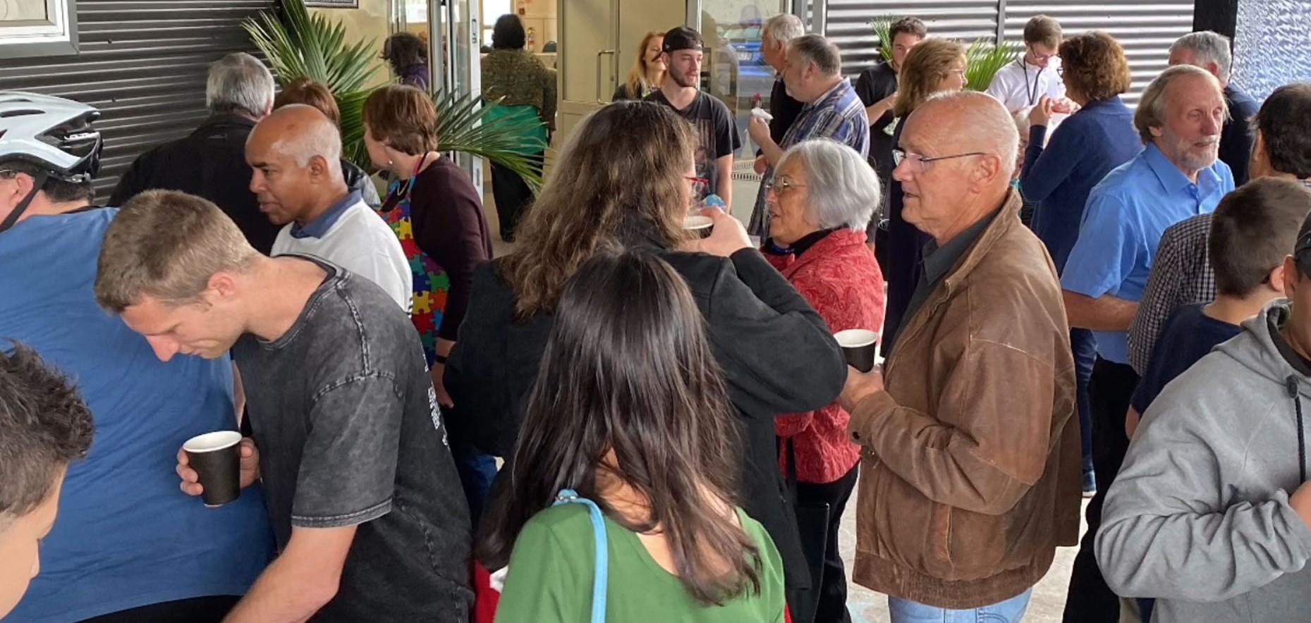 Crowd of people talking at Gateways Christian Fellowship church